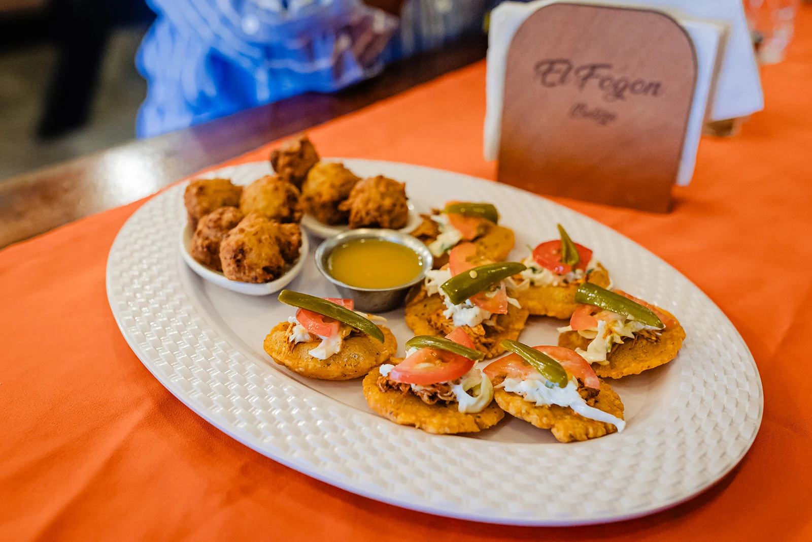 Salbutes and conch fritters served on a Belize Food Tours stop