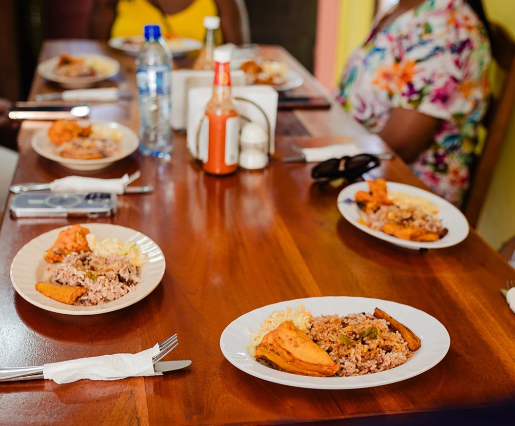 Plates set out for lunch on a wooden table